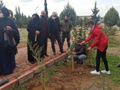 Her şehit için bir fidan toprakla buluşturuldu